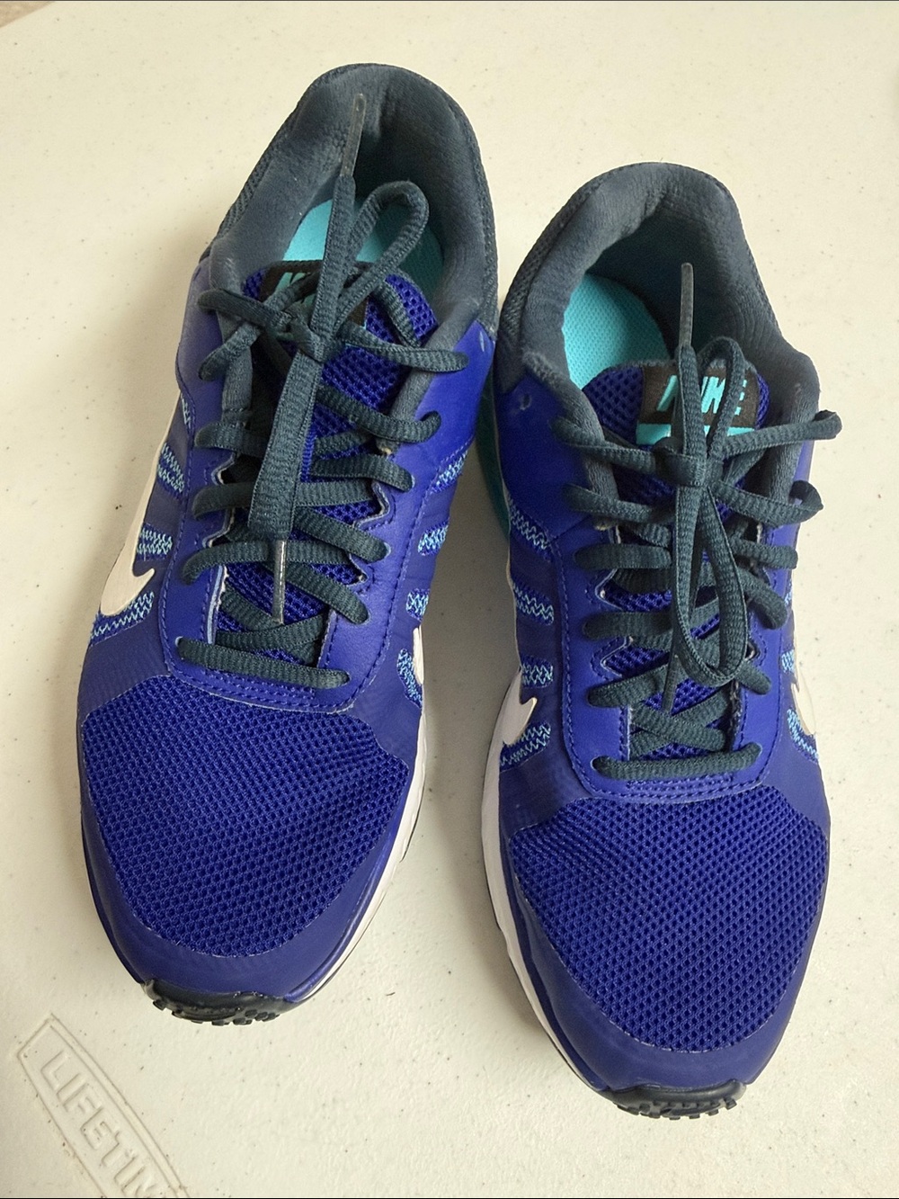 Nike Women's Athletic Sneakers in Deep Blue with Teal Insoles